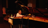 Dale Goodyear tuning piano for Lorie Line in Bemidji